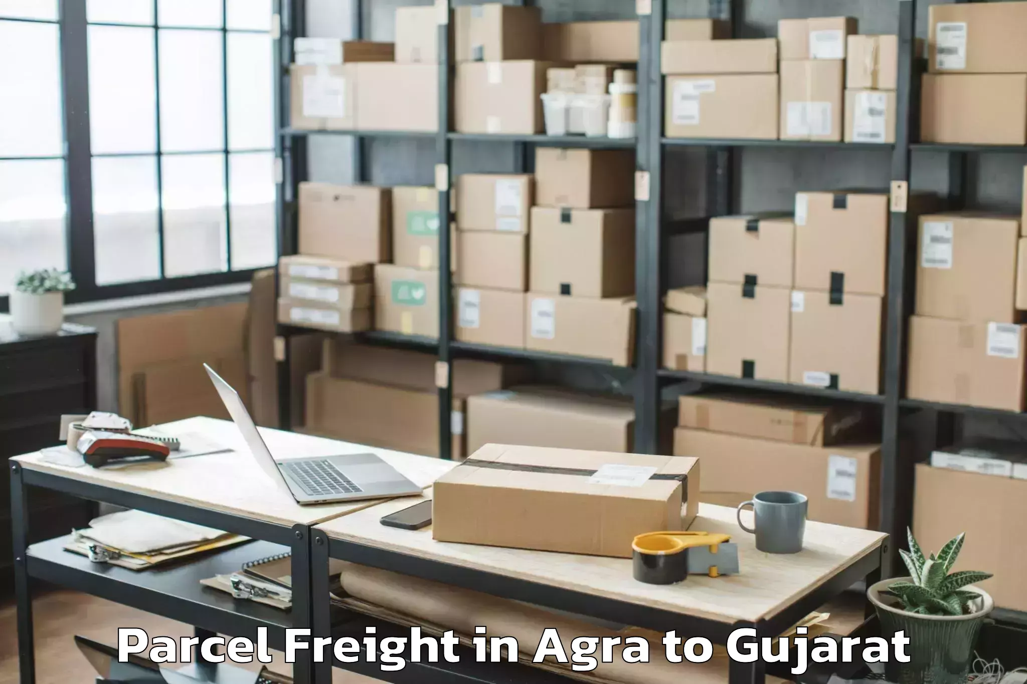 Top Agra to Crystal Mall Rajkot Parcel Freight Available